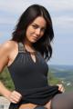 A woman in a black dress sitting on top of a rock.